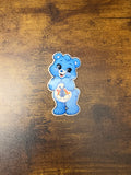 Cute blue bear sticker with rainbow, hearts and windmill coffee-inspired belly badge