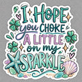 Teal and lavender coastal sticker with shamrocks, starfish, seashell and text I Hope You Choke A Little On My Sparkle